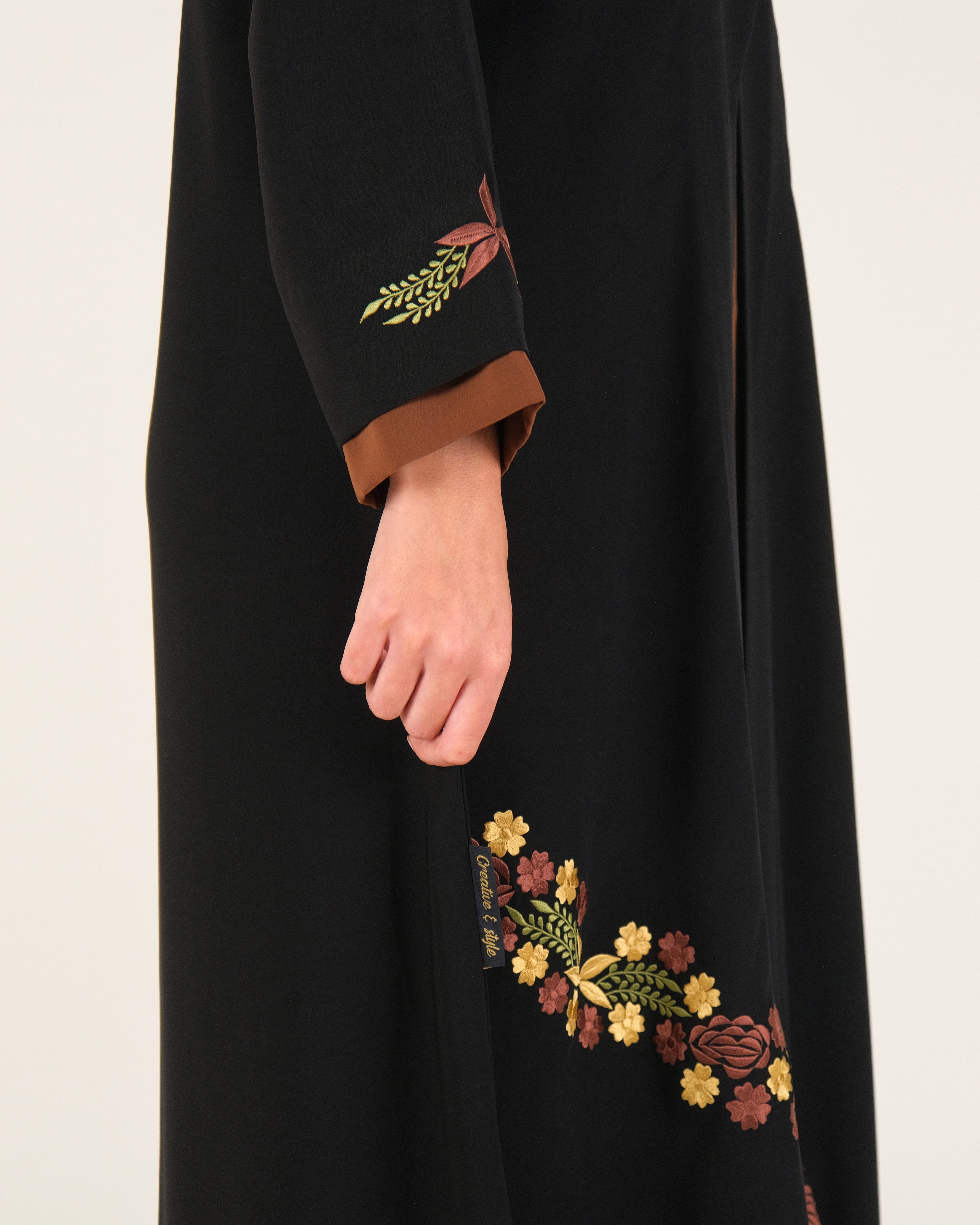 Floral Embroidered Tatreej Abaya – Black with Brown Contrast